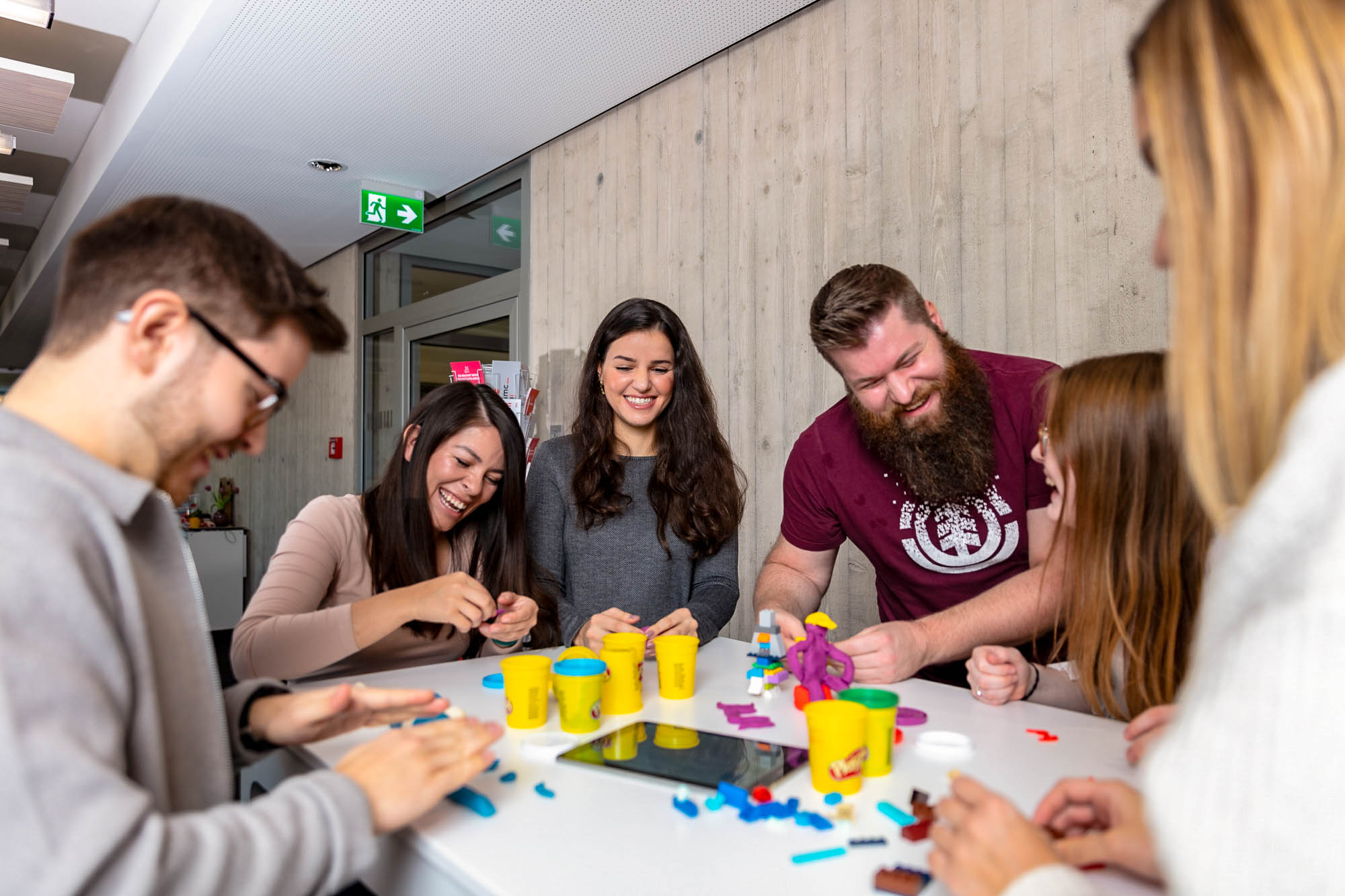 imc employees at play with playdough