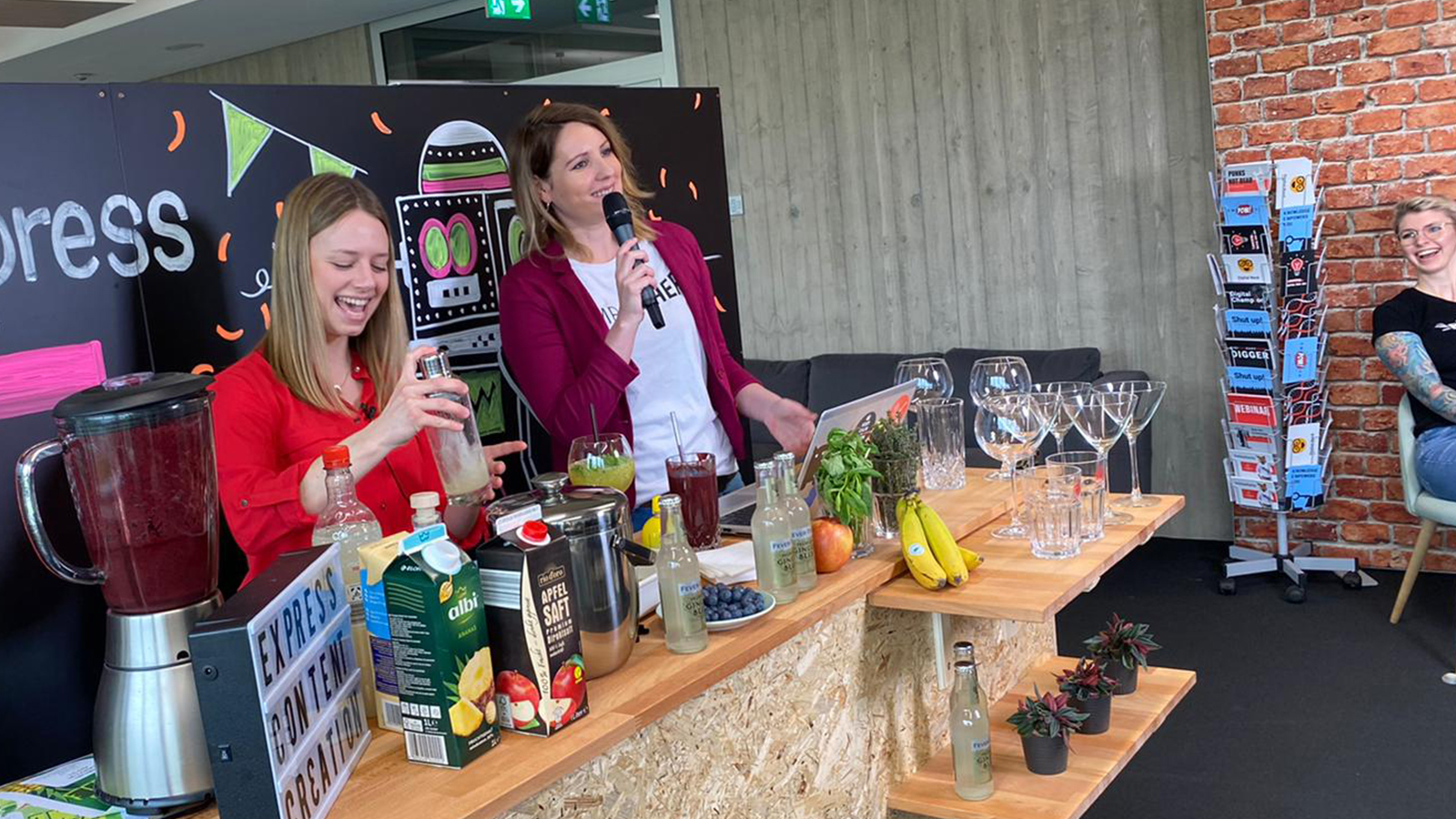 imc employees mix cocktails at product release party