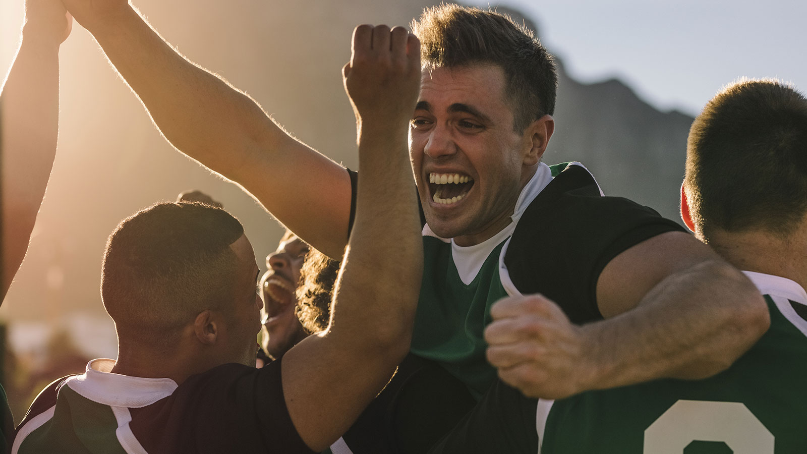 team celebrates victory